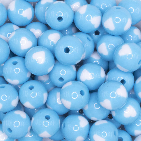 close up view of a pile of 16mm Sky Blue with White Hearts Bubblegum Beads