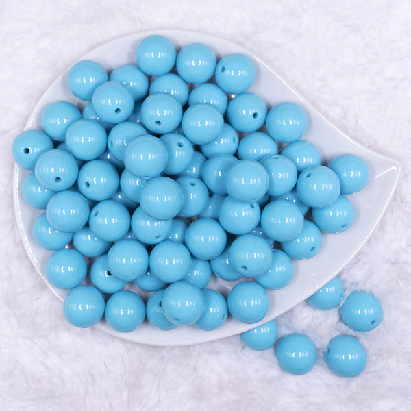 Top view of a pile of 16mm Sky Blue Solid Acrylic Bubblegum Jewelry Beads