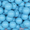 Close up view of a pile of 16mm Sky Blue Solid Acrylic Bubblegum Jewelry Beads