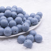 front view of a pile of 16mm Slate Blue Solid Acrylic Bubblegum Jewelry Beads