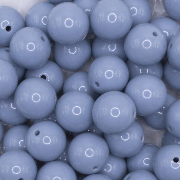 close up view of a pile of 16mm Slate Blue Solid Acrylic Bubblegum Jewelry Beads