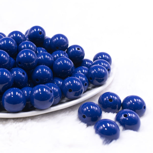 Front view of a pile of 16mm Indigo Blue Solid Acrylic Bubblegum Jewelry Beads
