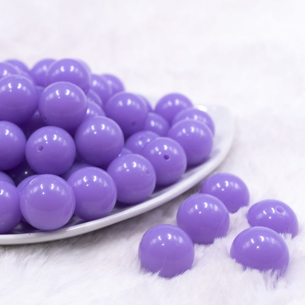 Front view of a pile of 16mm Pretty Purple Solid Acrylic Bubblegum Jewelry Beads