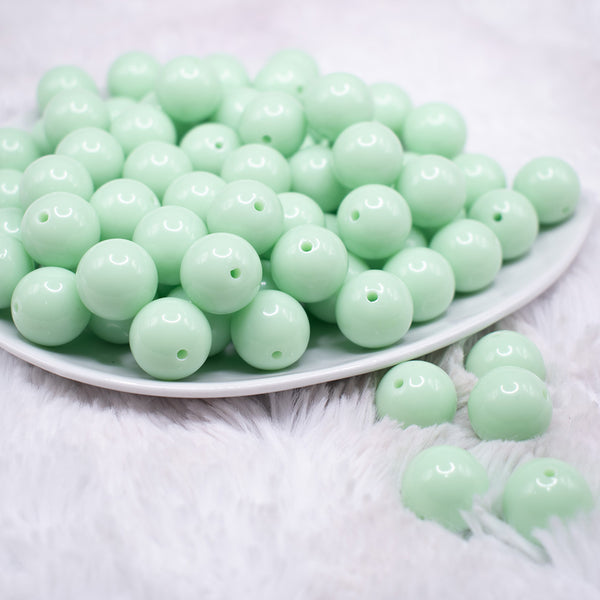 front view of a pile of 16mm Spearmint Green Solid Bubblegum Beads