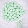 top view of a pile of 16mm Spearmint Green Solid Bubblegum Beads