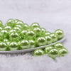 Front view of a pile of 16mm Spring Green Faux Pearl Acrylic Bubblegum Jewelry Beads