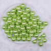 Top view of a pile of 16mm Spring Green Faux Pearl Acrylic Bubblegum Jewelry Beads