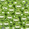 Close up view of a pile of 16mm Spring Green Faux Pearl Acrylic Bubblegum Jewelry Beads