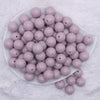 top view of a pile of 16mm Thistle Purple Solid Acrylic Bubblegum Jewelry Beads