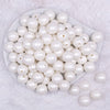 Top view of a pile of 16mm White Matte Pearl Acrylic Bubblegum Jewelry Beads