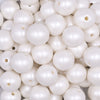 Close up view of a pile of 16mm White Matte Pearl Acrylic Bubblegum Jewelry Beads