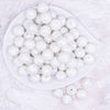 top view of a pile of 16mm White Tablet Acrylic Bubblegum Beads