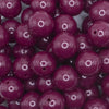 close up view of a pile of 16mm Plum Purple Solid Acrylic Bubblegum Jewelry Beads