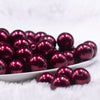 Front view of a pile of 16mm Wine Red Faux Pearl Acrylic Bubblegum Jewelry Beads
