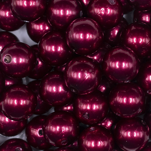 Close up view of a pile of 16mm Wine Red Faux Pearl Acrylic Bubblegum Jewelry Beads