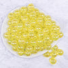 top view of a pile of 16mm Yellow Crackle AB Bubblegum Beads