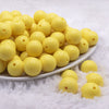 front view of a pile of 12mm Yellow Solid Acrylic Bubblegum Beads