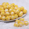front view of a pile of 16mm Yellow Tablet Acrylic Bubblegum Beads