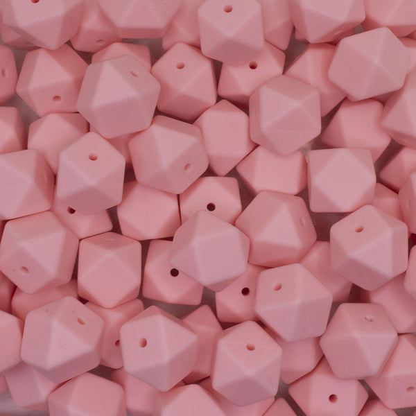 close up view of a pile of 17mm Candy Pink Hexagon Silicone Bead