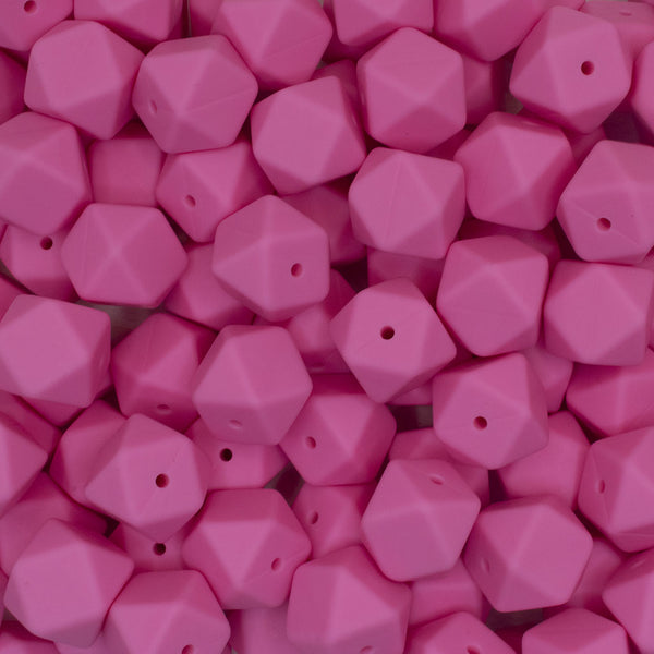 front view of a pile of 17mm Pink Hexagon Silicone Bead