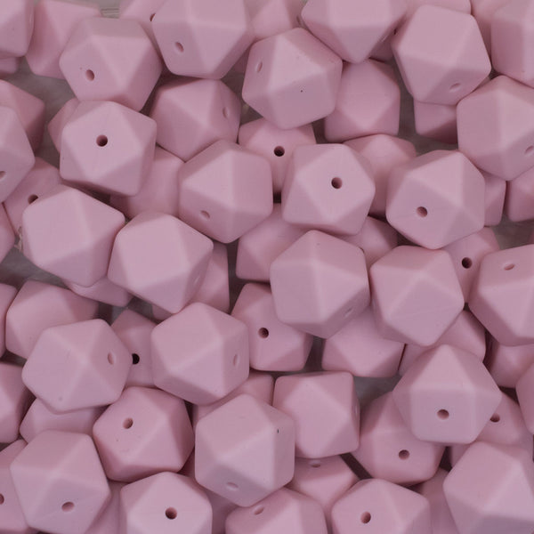 front view of a pile of 17mm Quartz Pink Hexagon Silicone Bead