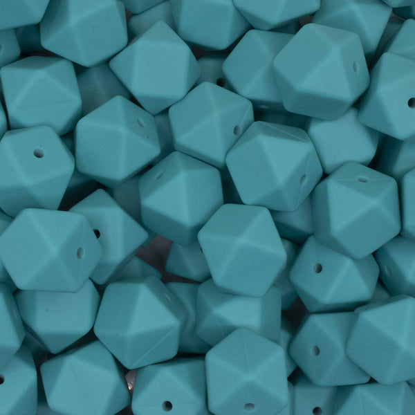 front view of a pile of 17mm Turquoise Hexagon Silicone Bead