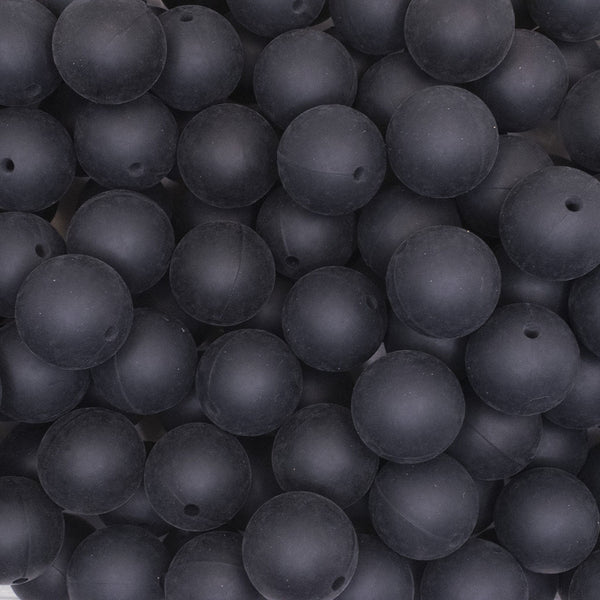 close up view of a pile of 19mm Black Round Silicone Bead