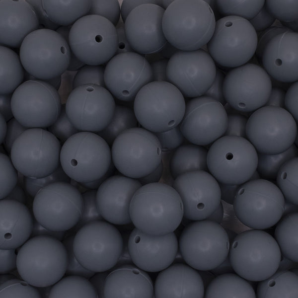 close up view of a pile of 19mm Dim Gray Round Silicone Bead