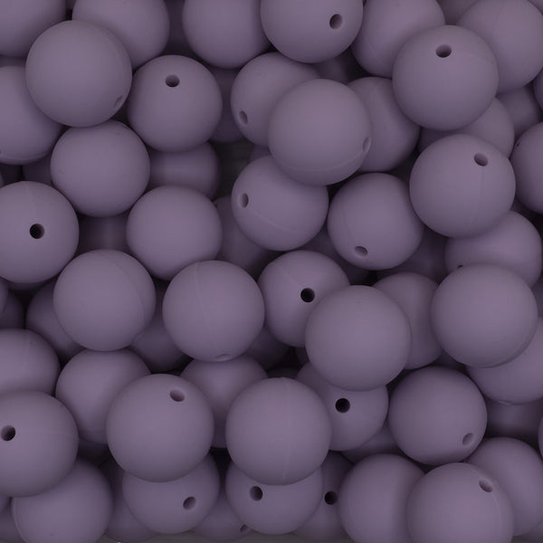 close up view of a pile of 19mm Lilac Purple Round Silicone Bead