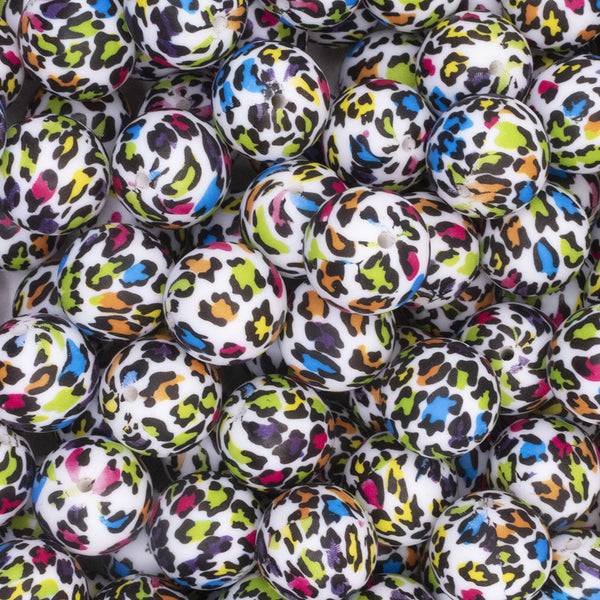 top view of a pile of 19mm Rainbow Leopard Print Round Silicone Bead