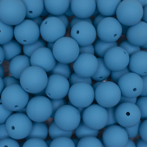 close up view of pile of 19mm Sky Blue Round Silicone Bead