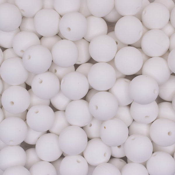 close up view of a pile of 19mm White Round Silicone Bead
