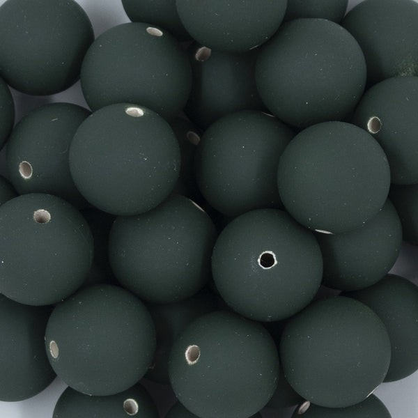 Close up view of a pile of 20mm Camo Green Matte 