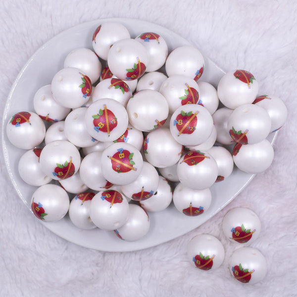 Top view of a pile of 20mm ABC Apple print on Matte White Chunky Acrylic Bubblegum Beads Jewelry