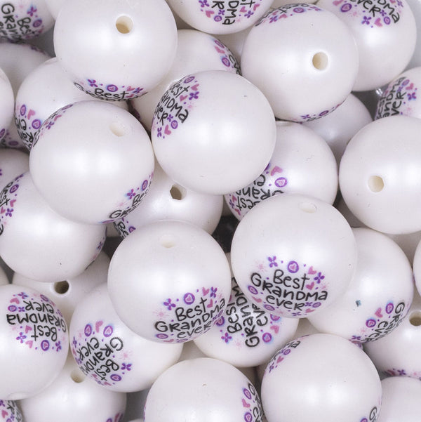 Close up view of a pile of 20mm Best Grandma Print on Matte White Chunky Acrylic Bubblegum Beads