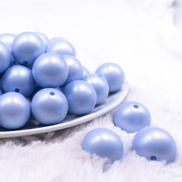 Front view of a pile of 20mm Blue Matte Pearl Solid Jewelry Acrylic Bubblegum Beads