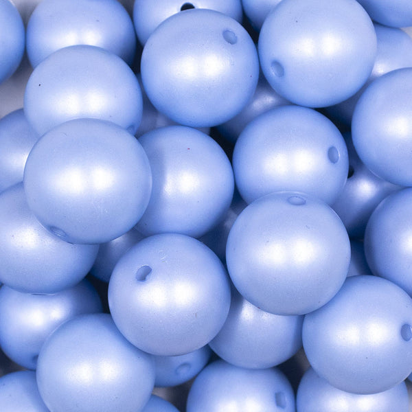 Close up view of a pile of 20mm Blue Matte Pearl Solid Jewelry Acrylic Bubblegum Beads