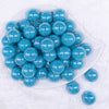 Top view of a pile of 20MM Blue Neon AB Solid Chunky Bubblegum Beads