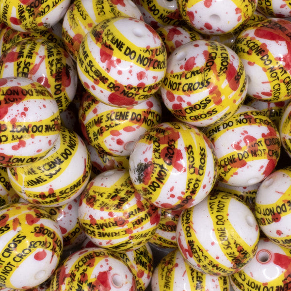 Close up view of a pile of 20mm Crime Scene printed Acrylic Bubblegum Beads