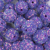 close up view of a pile of 20mm Purple Sequin Confetti Bubblegum Beads