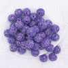 top view of a pile of 20mm Purple Sequin Confetti Bubblegum Beads