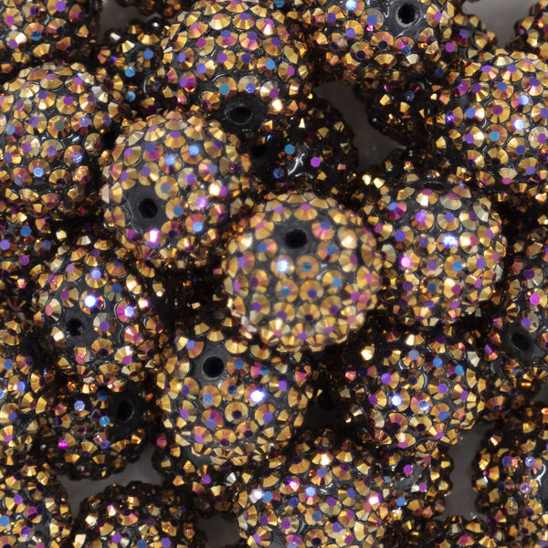 Close Up view of a pile of 20mm Golden Black Coffee Rhinestone AB Bubblegum Beads