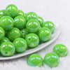 Front view of a pile of 20MM Green Neon AB Solid Chunky Bubblegum Beads