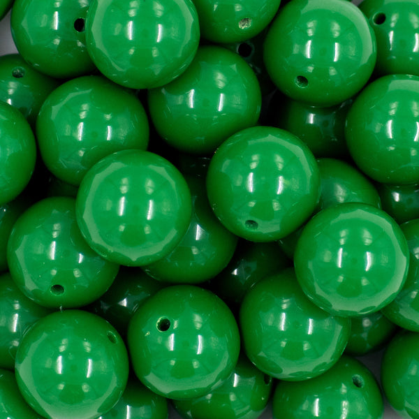 close up view of a pile of 20mm Green Solid Bubblegum Beads
