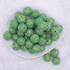 top view of a pile of 20mm Green Sequin Confetti Bubblegum Beads