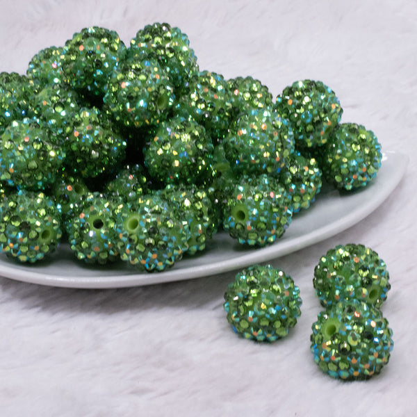front view of a pile of 20mm Green Confetti Rhinestone AB Bubblegum Beads