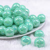 Front view of a pile of 20MM Light Blue Neon AB Solid Chunky Bubblegum Beads