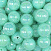 Close up view of a pile of 20MM Light Blue Neon AB Solid Chunky Bubblegum Beads