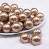 front view of a pile of 20mm Light Champagne with Glitter Faux Pearl Bubblegum Beads