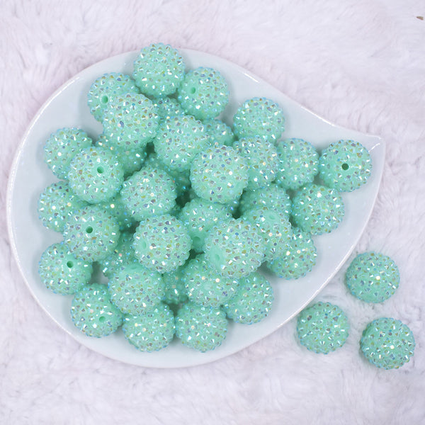 top view of a pile of 20mm Neon Light Blue Rhinestone AB Bubblegum Beads